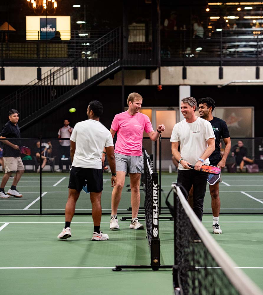 Teams congratulating one another after a good game of Pickleball at GTM